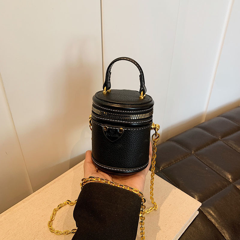 Bucket torba od PU, cilindrični oblik, zatvaranje zipom, džep za telefon, jedan naramenica