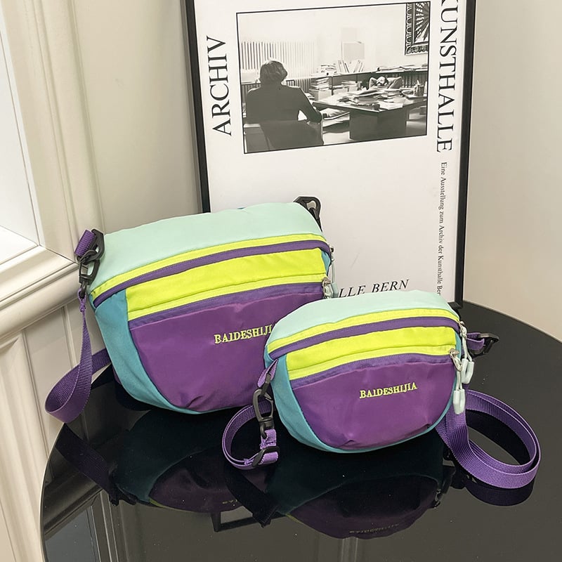 Ženska crossbody torba u urbanom minimalističkom stilu, poliester, horizontalni kvadratni oblik, zatvaranje na zatvarač, unutarnji ID džep