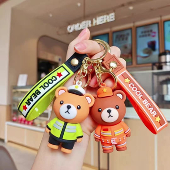 Karikatuurne karu politseinik ja tuletõrjuja – võtmehoidja, plüüsi autoeha kaunistus (Materjal: pehme liim; Ühekordselt pakendatud)