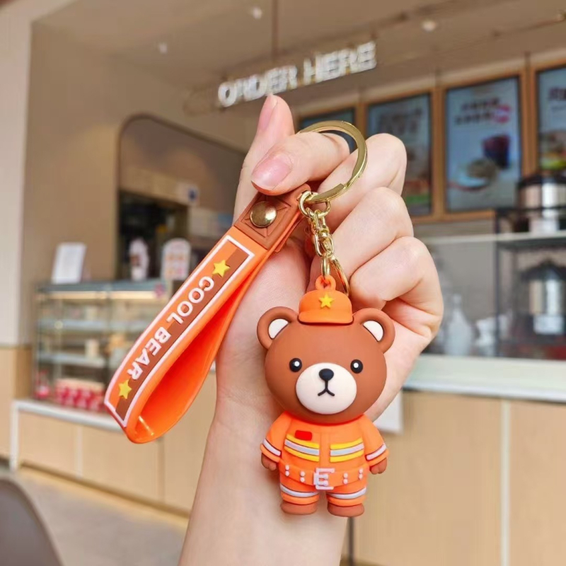 Karikatuurne karu politseinik ja tuletõrjuja – võtmehoidja, plüüsi autoeha kaunistus (Materjal: pehme liim; Ühekordselt pakendatud)