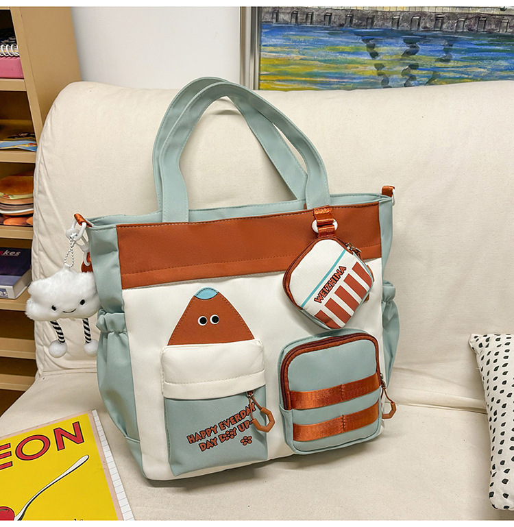 Krosbody torba za dopunske lekcije – platno, podstava od najlona, anime uzorak, za djevojke, od srednje škole pa nadalje