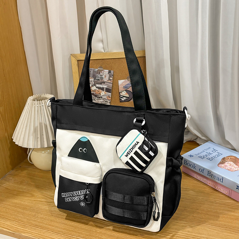 Krosbody torba za dopunske lekcije – platno, podstava od najlona, anime uzorak, za djevojke, od srednje škole pa nadalje