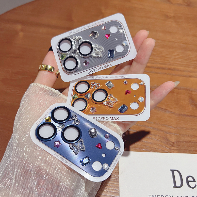 Prsteň ochrany objektívu fotoaparátu pre iPhone 17 s rhinestones, diamantovou vsadkou a hviezdičkovým motívom