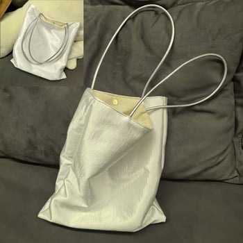 Ženska svilenkasta torba preko ramena, kibiro veida forma, zatvaranje kopčom, džep za kameru, podstava od platna