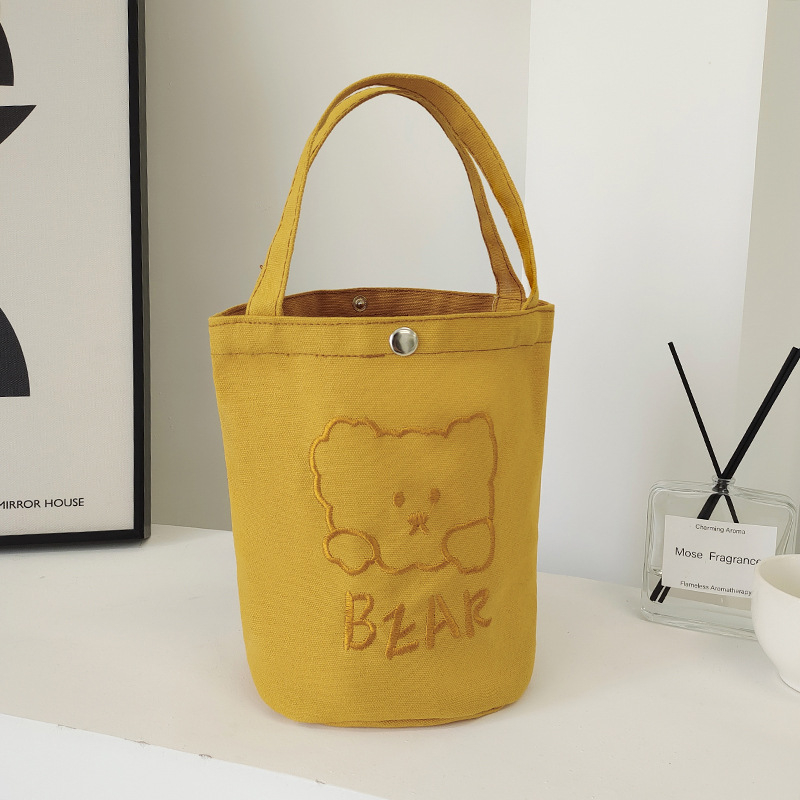 Ženska platnena bucket torba, gradski minimalistički stil, uspravni kvadratni oblik, dvostruke naramenice, za svakodnevnu upotrebu