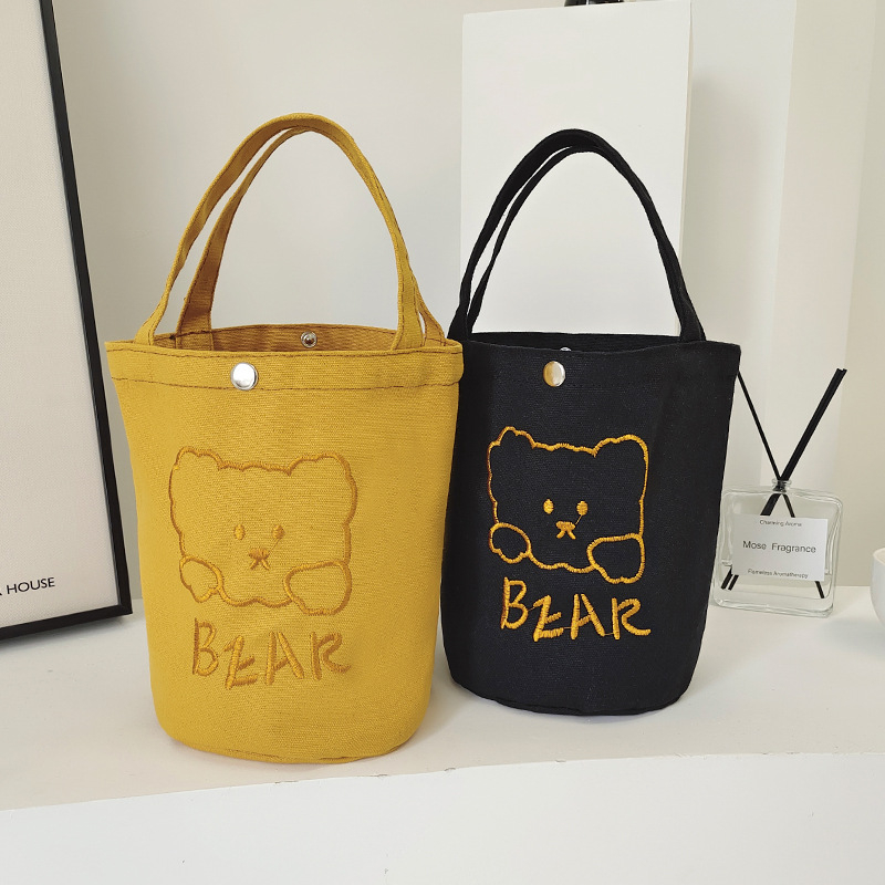 Ženska platnena bucket torba, gradski minimalistički stil, uspravni kvadratni oblik, dvostruke naramenice, za svakodnevnu upotrebu