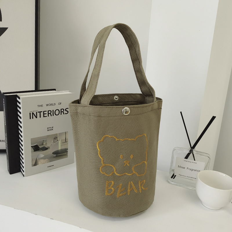 Ženska platnena bucket torba, gradski minimalistički stil, uspravni kvadratni oblik, dvostruke naramenice, za svakodnevnu upotrebu