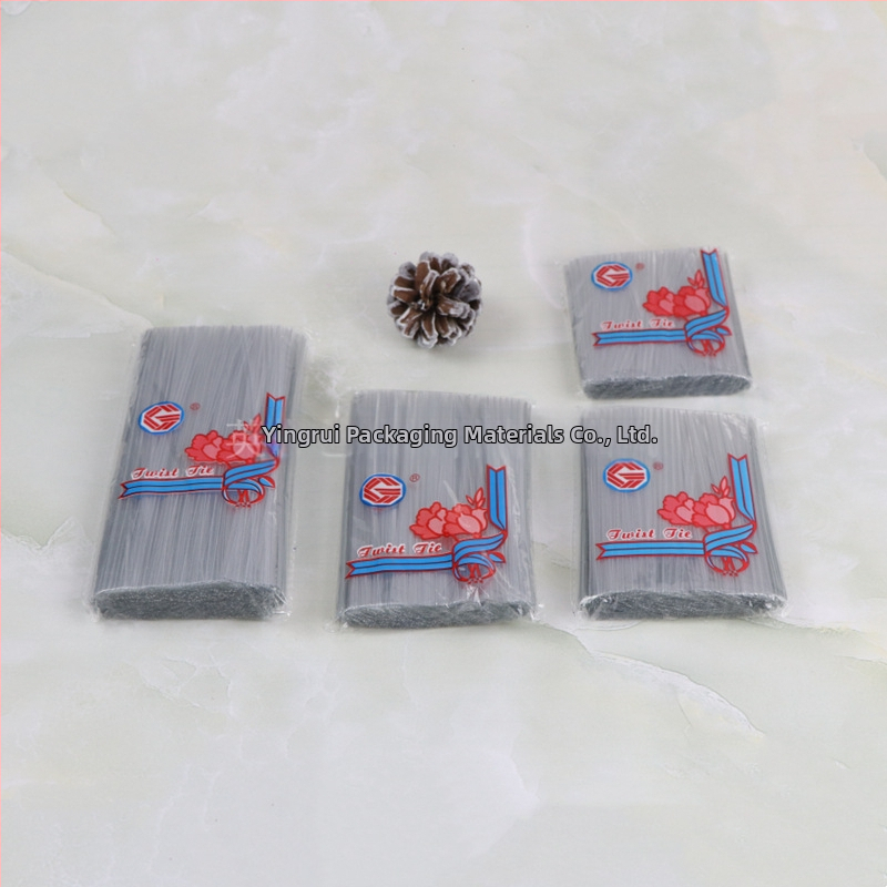 Keskkonnasõbralik läbipaistev sidumisvard toidu pakkimiseks ja DIY lilleprojektide jaoks; Materjal: läbipaistev komposiitfilmi kattega galvaniseeritud traat; Mõõtmed: 4x250; Paksus: 0,4; Privaatne märgistamine saadaval