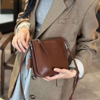 Geantă crossbody unisex din PU, stil bucket, închidere cu șnur și buzunar interior laminat cu fermoar