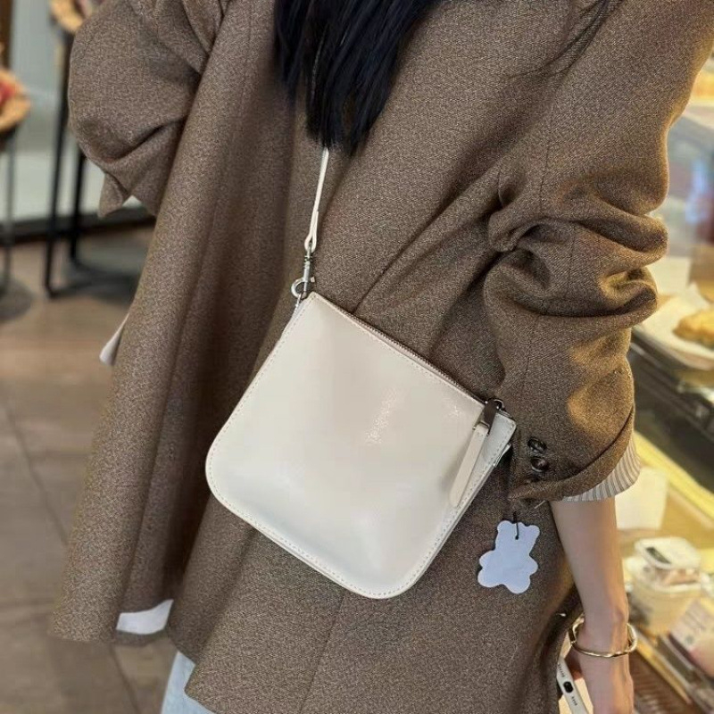 Geantă crossbody unisex din PU, stil bucket, închidere cu șnur și buzunar interior laminat cu fermoar