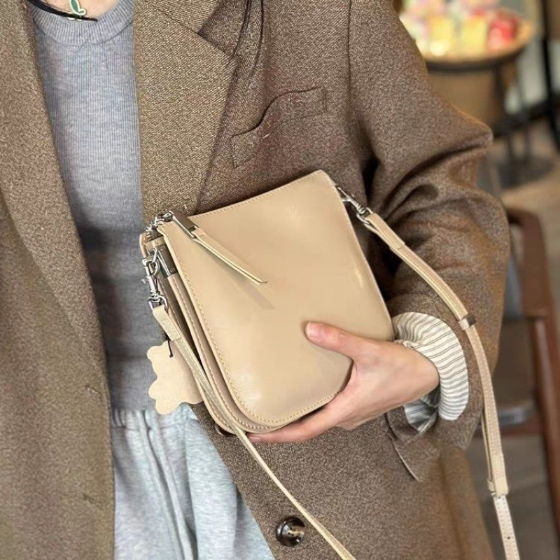 Geantă crossbody unisex din PU, stil bucket, închidere cu șnur și buzunar interior laminat cu fermoar