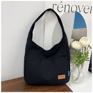 Platnena tote torba s urbanim minimalistickim dizajnom, magnetsko zatvaranje, najlonska podstava, vodoravni kvadratni oblik, jedna naramenica