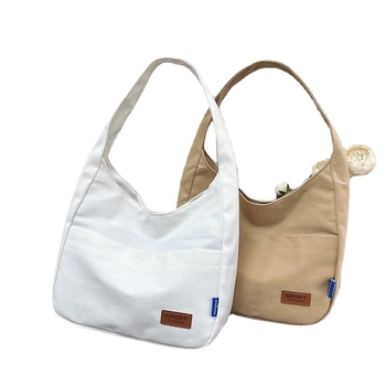 Platnena tote torba s urbanim minimalistickim dizajnom, magnetsko zatvaranje, najlonska podstava, vodoravni kvadratni oblik, jedna naramenica