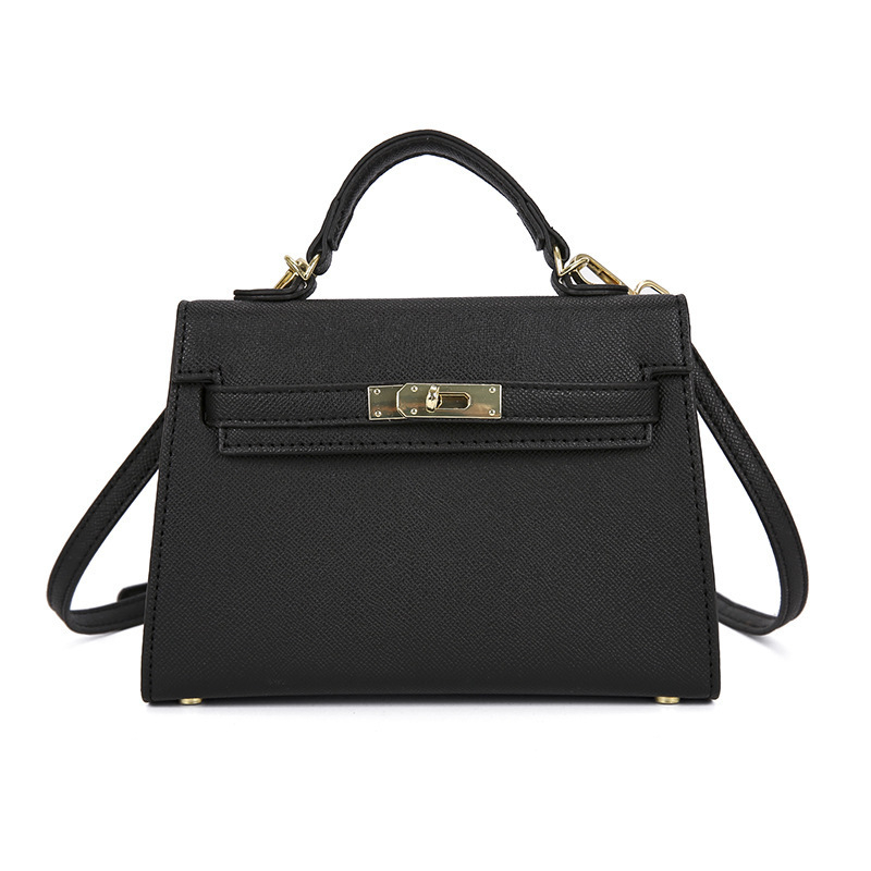Crossbody torbica s bravom (Materijal: PU; Podstava: sintetička koža; Oblik: horizontalni kvadrat; Unutarnja: džep za mobitel; Remen: jedan)