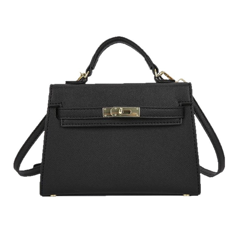 Crossbody torbica s bravom (Materijal: PU; Podstava: sintetička koža; Oblik: horizontalni kvadrat; Unutarnja: džep za mobitel; Remen: jedan)