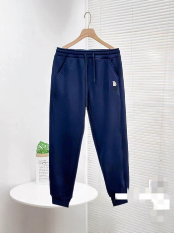 Бродирани памучни дълги панталони със средно висока талия и свободна кройка