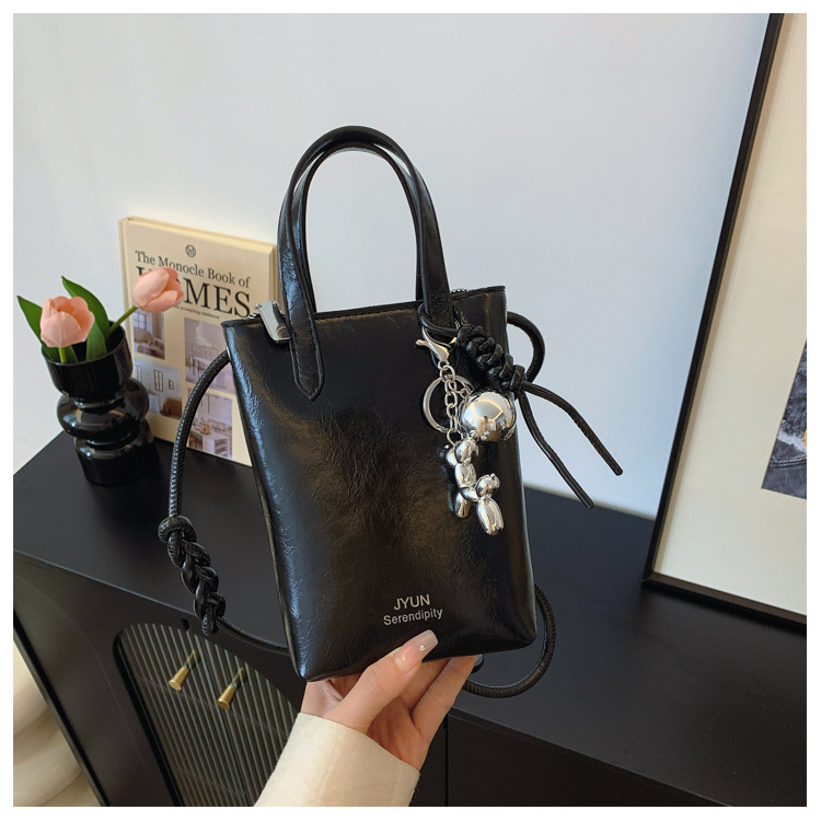 PU anyagú lágy bucket táska nőknek, cipzáras nyitás, rejtett cipzáras zseb, horizontális négyszögletes forma