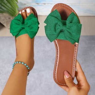 Ženske papuče s mašnicom, ravna potplata - velur gornji dio, PVC đon, PU unutrašnjost, okrugli vrh, slip-on