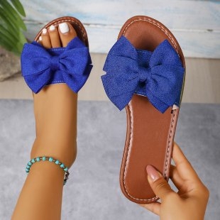 Ženske papuče s mašnicom, ravna potplata - velur gornji dio, PVC đon, PU unutrašnjost, okrugli vrh, slip-on