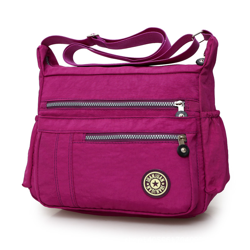 Nylon crossbody torba za žene – nylon podstava, zatvarač, vodoravni kvadratni oblik, unutarnji džep sa zipom (jesen 2023)