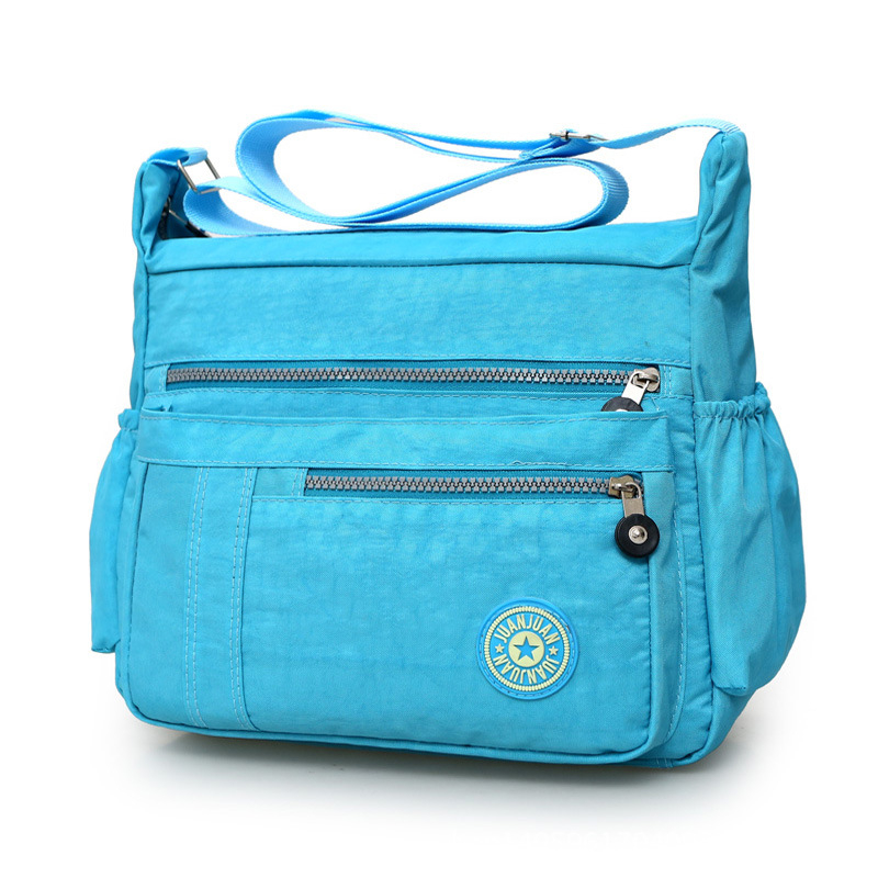 Nylon crossbody torba za žene – nylon podstava, zatvarač, vodoravni kvadratni oblik, unutarnji džep sa zipom (jesen 2023)