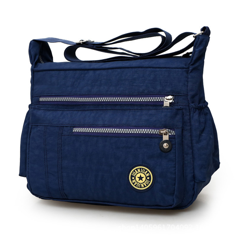 Nylon crossbody torba za žene – nylon podstava, zatvarač, vodoravni kvadratni oblik, unutarnji džep sa zipom (jesen 2023)
