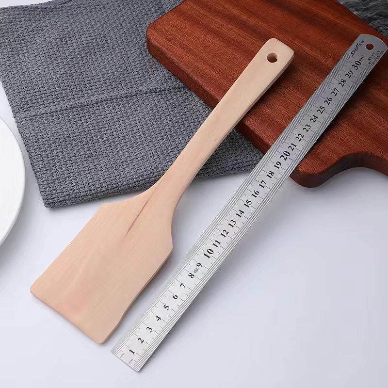 Σπατούλα μαγειρικής, ξύλινη κατασκευή με λαβή από ξύλο, ανθεκτική στη θερμοκρασία (Υλικό: Ξύλο; Λαβή: Ξύλινη; Λειτουργία: Αντοχή σε υψηλές θερμοκρασίες)