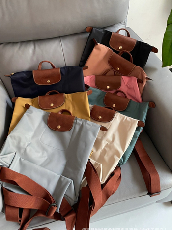 Rucsac din nylon impermeabil, capacitate 36–55 L, compatibil cu laptop de 15 inci