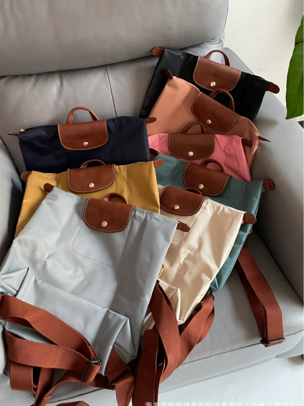 Rucsac din nylon impermeabil, capacitate 36–55 L, compatibil cu laptop de 15 inci