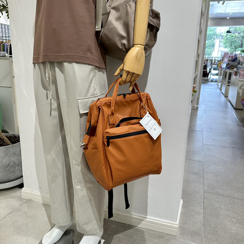 Unisex crni vodootporni ruksak u korejskom stilu za poslovne i putne potrebe, proširivi, kapacitet 36–55L, za 14-inčni prijenosnik, PU