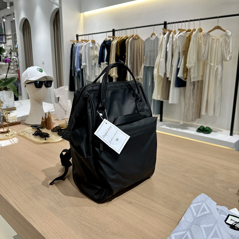 Unisex crni vodootporni ruksak u korejskom stilu za poslovne i putne potrebe, proširivi, kapacitet 36–55L, za 14-inčni prijenosnik, PU