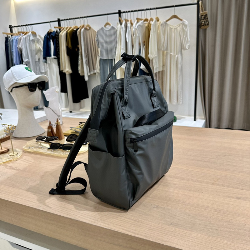 Unisex crni vodootporni ruksak u korejskom stilu za poslovne i putne potrebe, proširivi, kapacitet 36–55L, za 14-inčni prijenosnik, PU