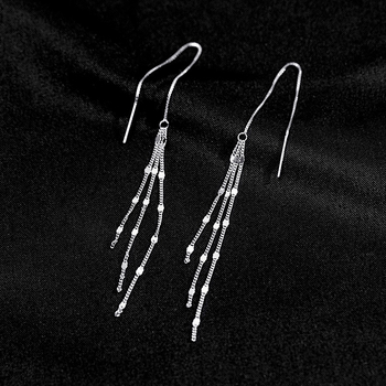 Under the banyan tree – Ezüst S925 fülbevalók hosszú tassellel, formák: hullám, csepp, csillag, geometriai; stílus: hideg szél; nyár 2024