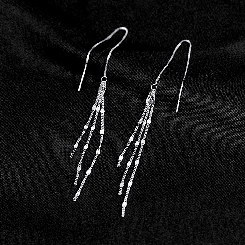 Under the banyan tree – Ezüst S925 fülbevalók hosszú tassellel, formák: hullám, csepp, csillag, geometriai; stílus: hideg szél; nyár 2024