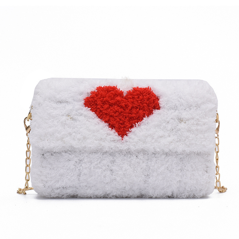 Női plüss táska, négyszögletes formájú, mágneszáras, nylon bélés, egy vállpánt, mindennapi használatra