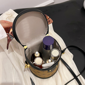 Bucket bag od PU materijala, gradski minimalistički stil, ovalni oblik, zatvaranje na zip, torba s poklopcem