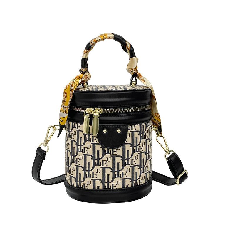 Bucket bag od PU materijala, gradski minimalistički stil, ovalni oblik, zatvaranje na zip, torba s poklopcem