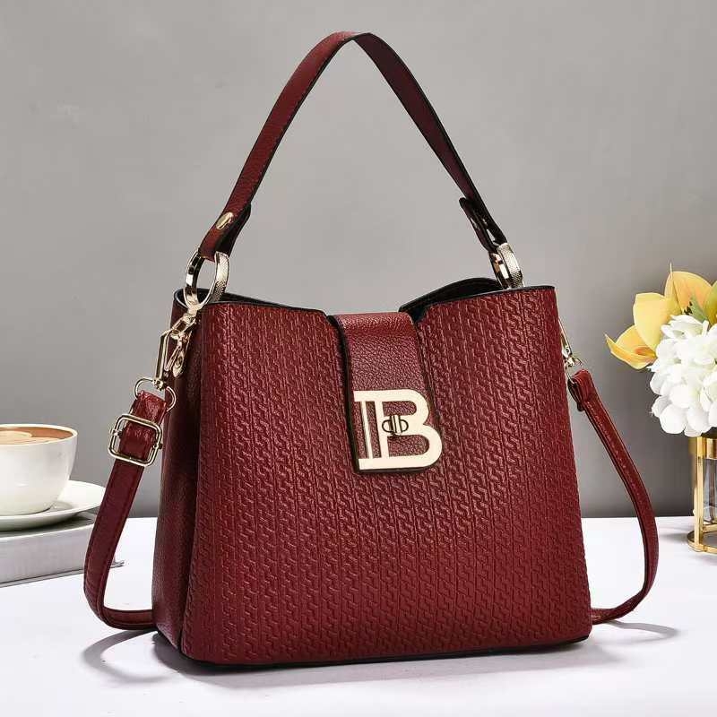 Geantă de umăr bucket din PU, stil urban minimalist, închidere cu lacăt, buzunare interioare pentru telefon și documente