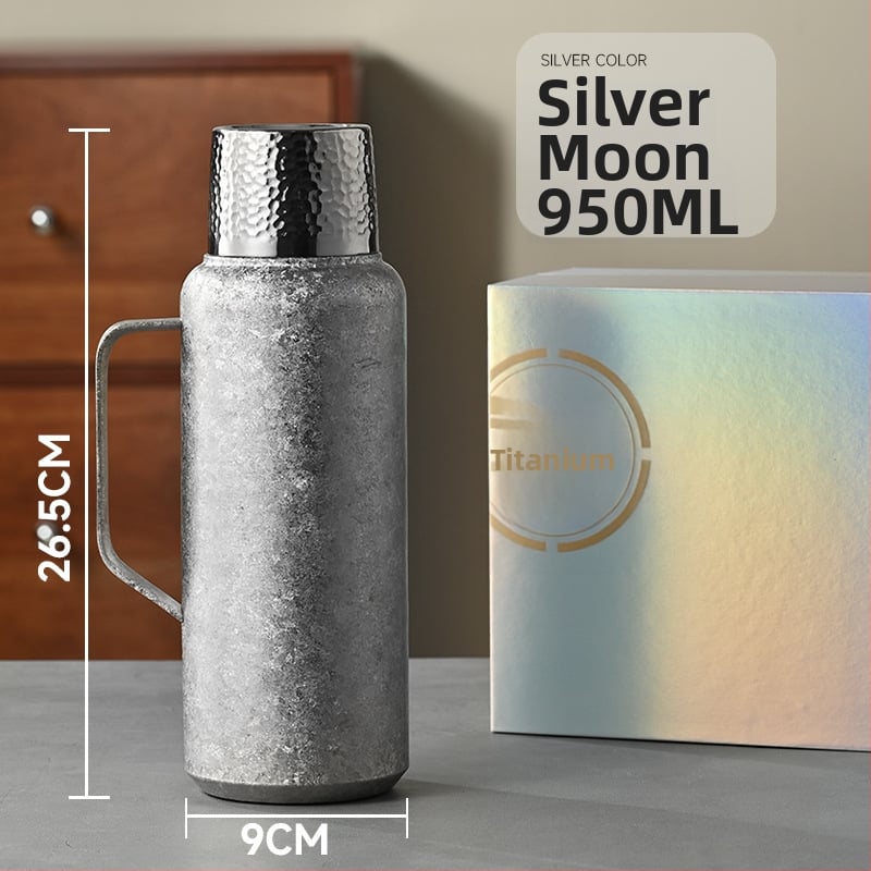 Tiszta titán termosz vákuum-szigeteltséggel, mechanikus hőmérővel, tea rekesszel és pop-up fedéllel.