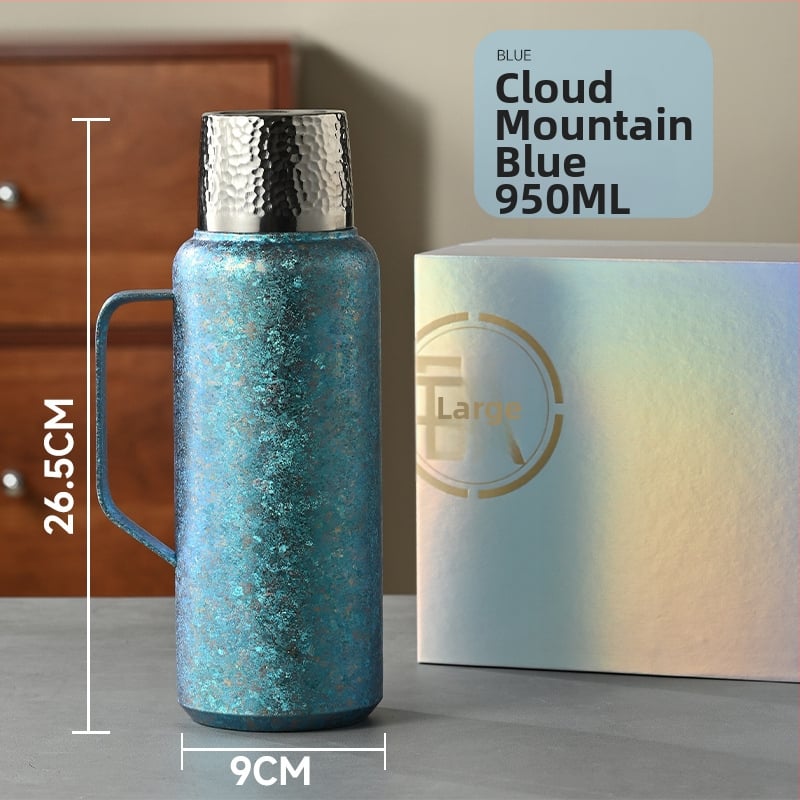 Tiszta titán termosz vákuum-szigeteltséggel, mechanikus hőmérővel, tea rekesszel és pop-up fedéllel.