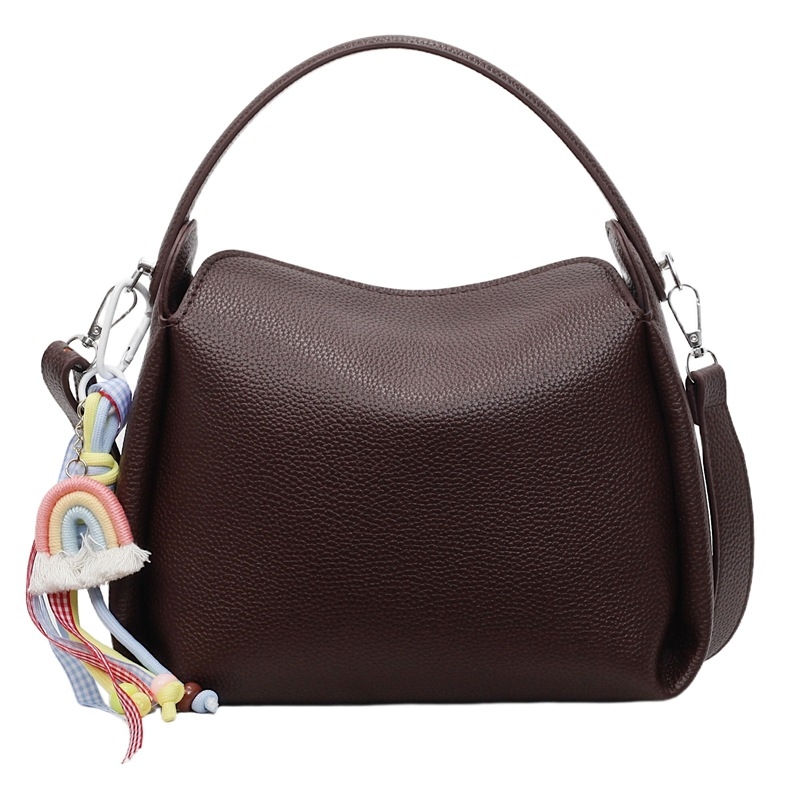 Crossbody torba od PU materijala, cilindričnog oblika, zatvarač, unutarnji pretinac za mobitel