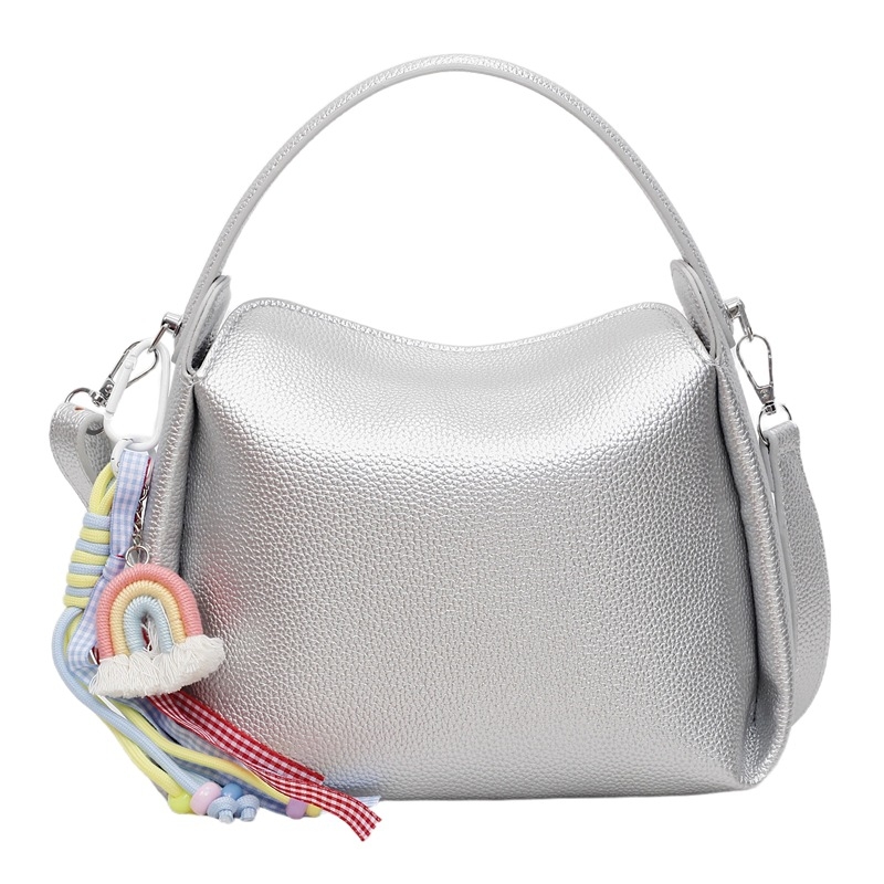 Crossbody torba od PU materijala, cilindričnog oblika, zatvarač, unutarnji pretinac za mobitel