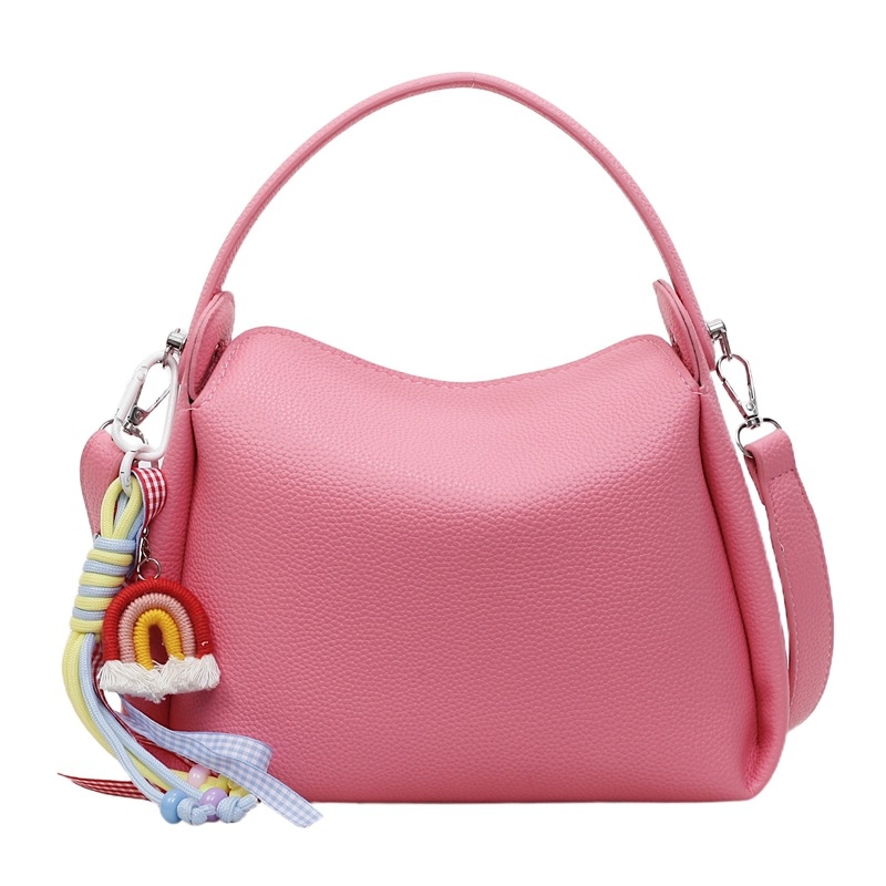 Crossbody torba od PU materijala, cilindričnog oblika, zatvarač, unutarnji pretinac za mobitel
