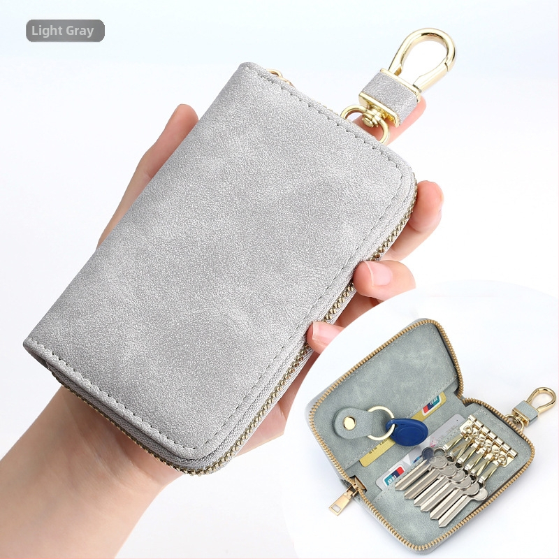 Torba za ključe W2036 – Unisex PVC, podstava od sintetičke kože, gradski minimalistički stil, zatvarač na zip