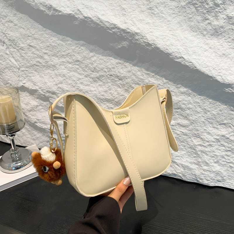 Bucket torba, urbani minimalistički stil, PU materijal, oblik koše, zatvarač, poliester podstava
