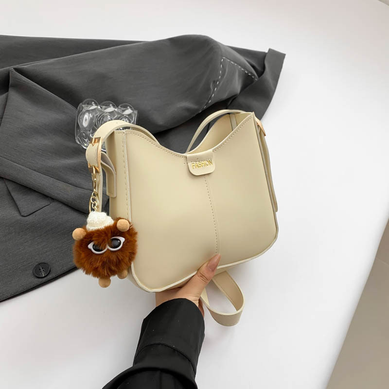 Bucket torba, urbani minimalistički stil, PU materijal, oblik koše, zatvarač, poliester podstava