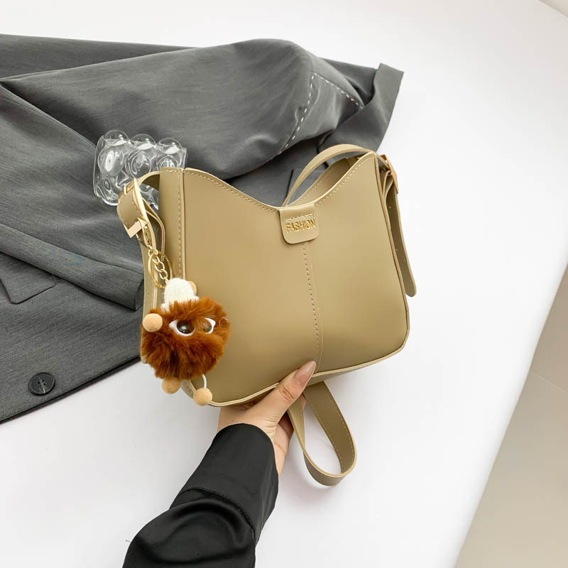 Bucket torba, urbani minimalistički stil, PU materijal, oblik koše, zatvarač, poliester podstava