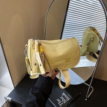 Urban minimalistička crossbody torba za telefon, poseban materijal, mala kvadratna torba, vodoravni kvadratni oblik, zatvaranje zipom.