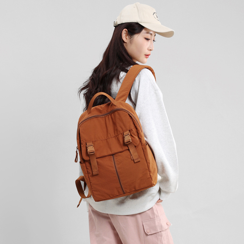 Rucsac unisex din nylon, stil urban minimalist, capacitate 20–35 L, compatibil cu laptop de 15 inci