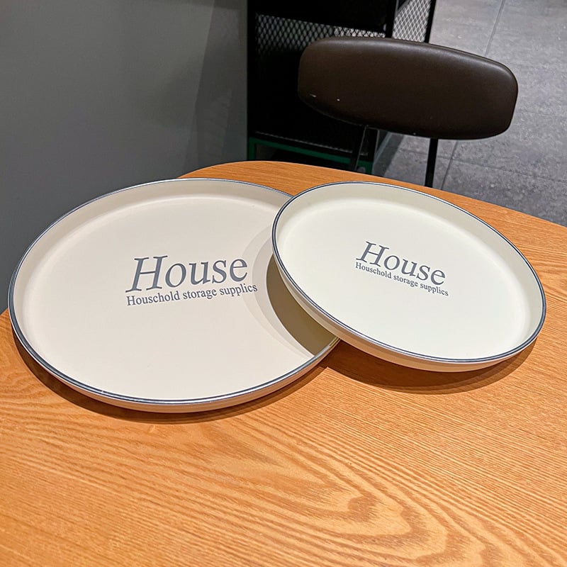 Pladanj, okrugli plastični podnos s glaziranom površinom; moderan minimalistički stil; mogućnost ispisa logotipa i prilagođavanja.